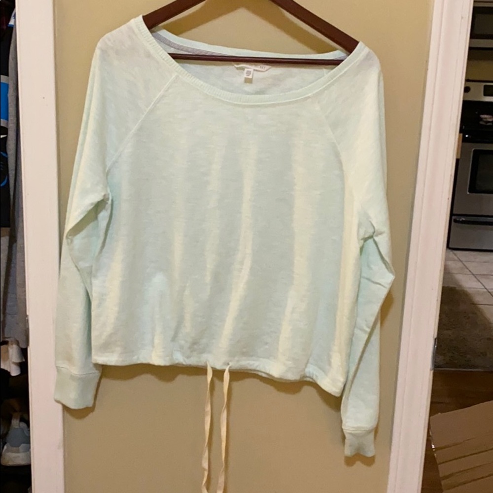 Shirt with cinch tie around bottom